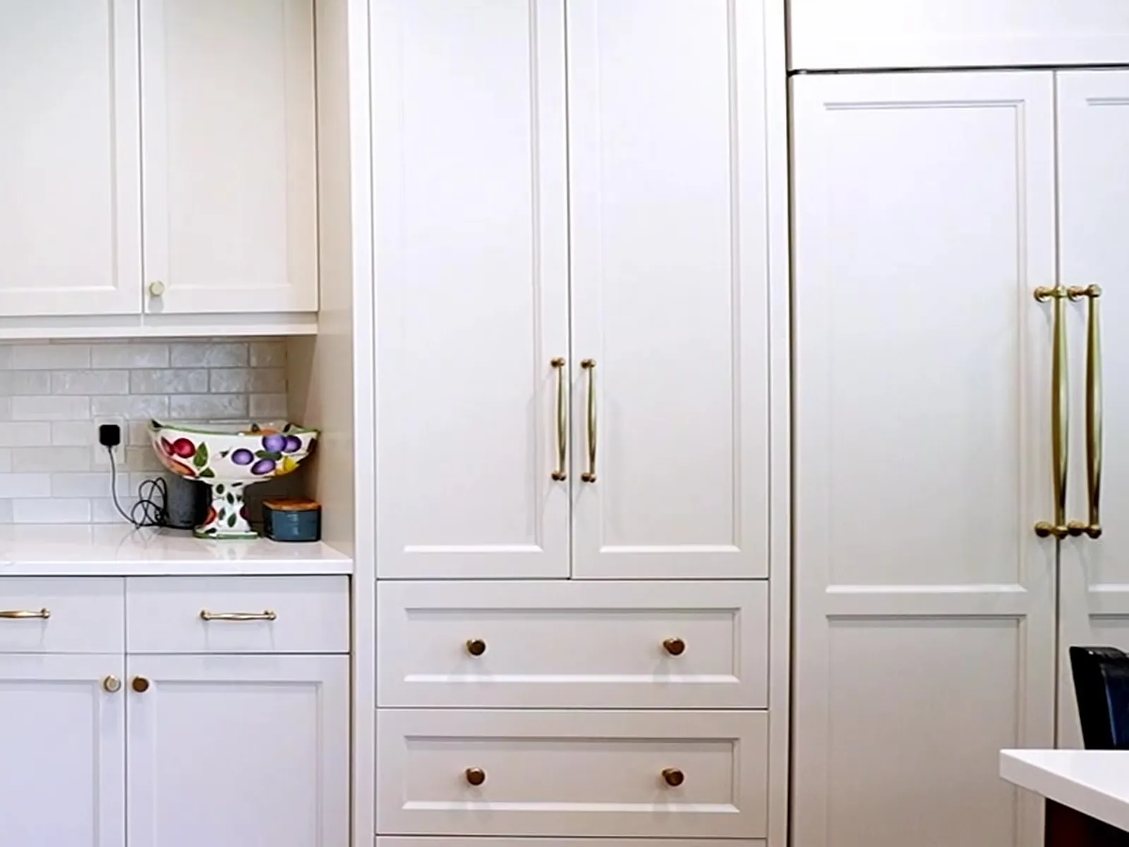 Finished cabinet doors with gold hardware — White Fox Cabinets